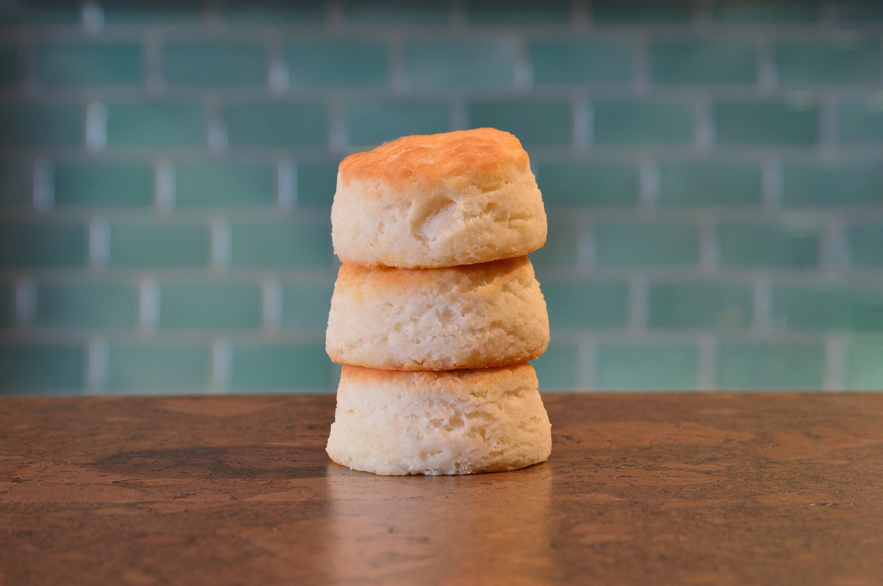 A stack of three beautiful homemade gluten-free biscuits