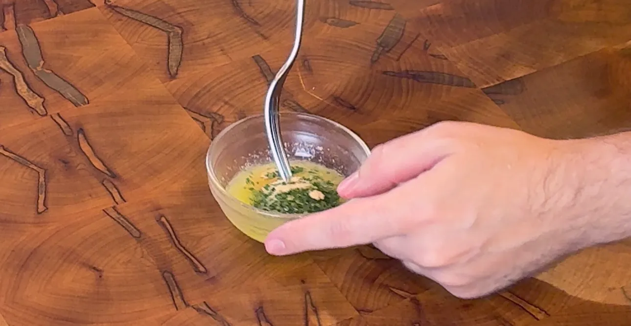 Bringing together a shaggy dough in the bowl